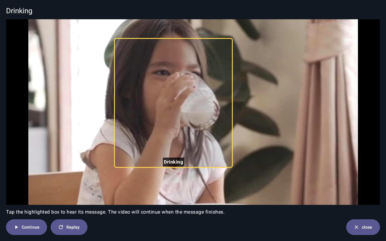 Drinking video paused with a highlighted message hotspot and Continue and Replay controls.