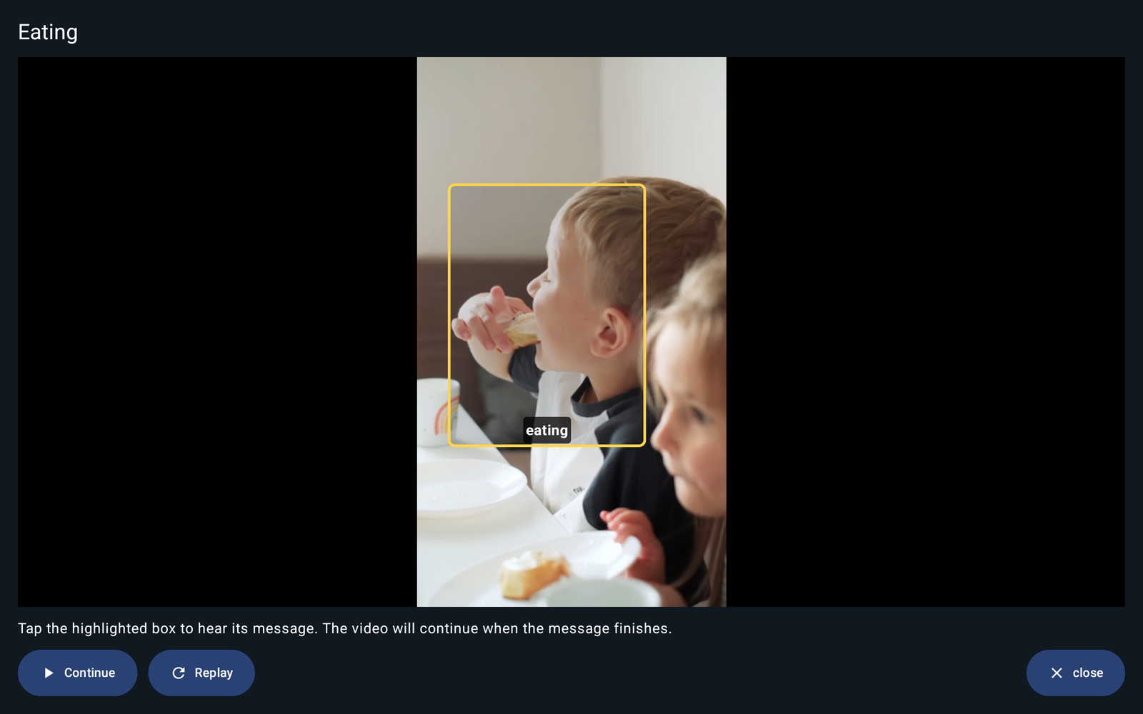 Yellow interactive spot around a child eating, with the label eating.